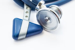 Blue,Stethoscope,And,Neurological,Hammer,Closeup,On,White,Background,As