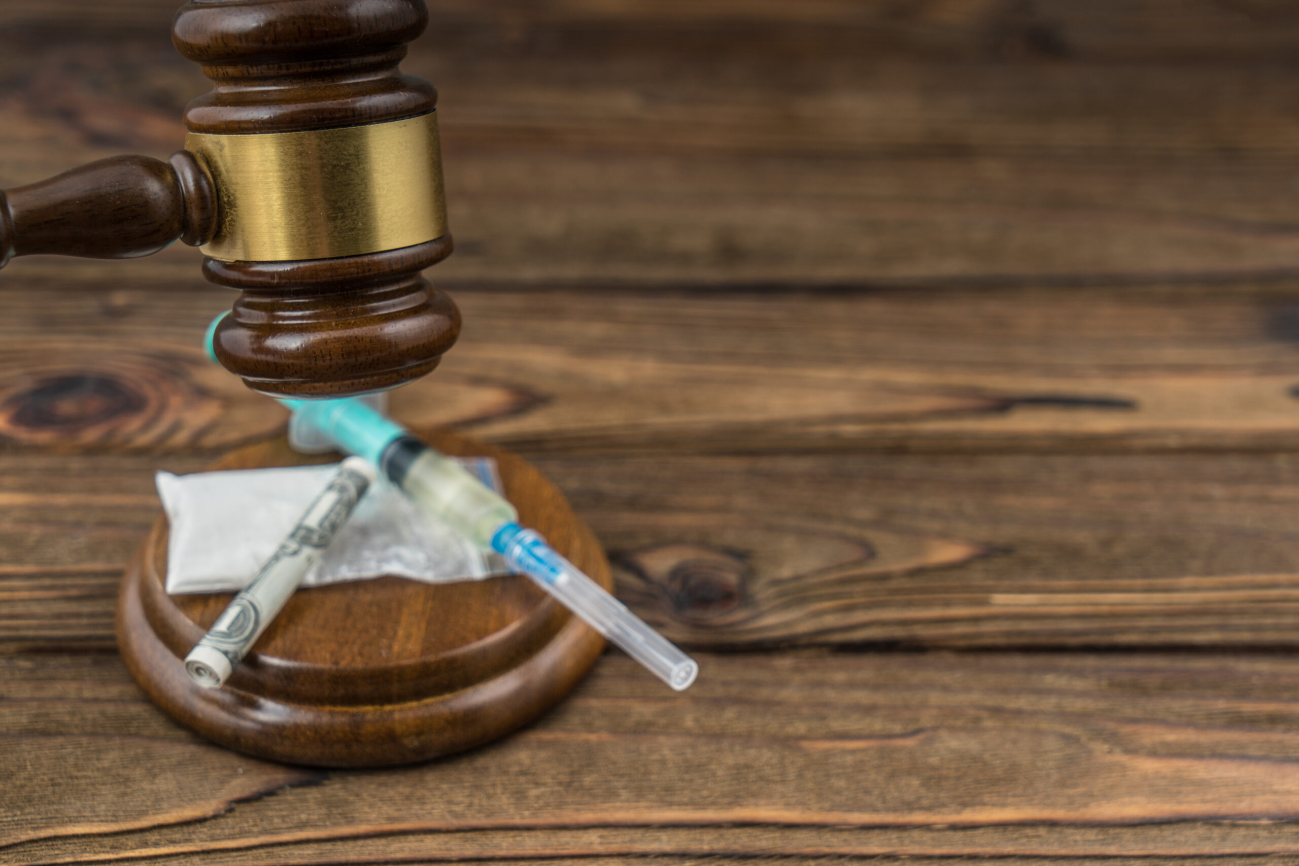 Judge,Gavel,And,Drugs,Close-up,With,Copy,Space.,Syringe,With